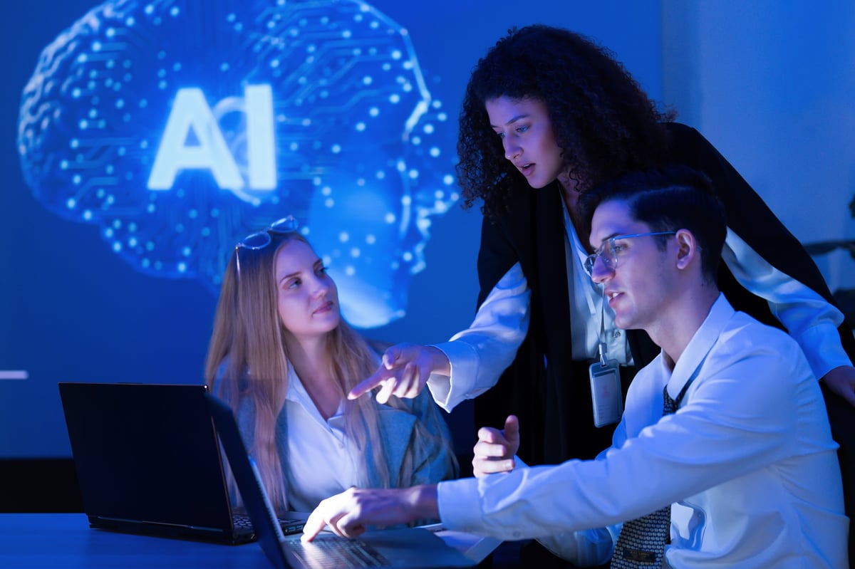Group of professionals discussing an artificial intelligence project in a modern setting